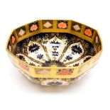 A Royal Crown Derby Imari 1128 pattern octagonal bowl, in the solid gold band, 20 cm in diameter,