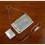 A silver visiting card case Birmingham 1905 and vesta with two napkin rings