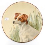 An Art Pottery painted charger of a Jack Russel Terrier,