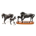 A Beswick figure animal group 'Black Beauty and foal on base,