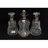 A pair of Mappin and Webb silver collared cut glass decanters, Birmingham 1914,