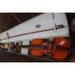 A 20th Century cased violin, bearing a label reading,