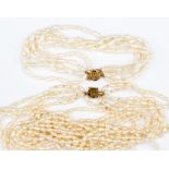 A five row set of fresh water rice grain pearl necklace and bracelet set,