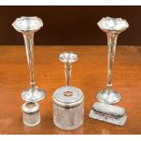 A pair of silver bud vases, Birmingham 1910, a single bud vase,