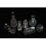 Three silver topped dressing table jars, studio glass,