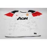 A signed Manchester United 2010/11 away team shirt (AON sponsored)