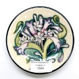 A small Moorcroft circular pin dish,