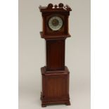 A miniature grandfather clock,