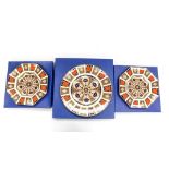 Two boxed Royal Crown Derby 1128 Imari octagonal plates and a boxed Royal Crown Derby 1128 Imari