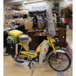 A Batavus 50cc "Go-Go" Moped. Complete with leg screens and windsheild. Original Yellow paintwork.