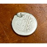 An Indian silver Rupee,