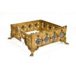 A Gothic Revival gilt metal ecclesiastical mount or stand, square section, reticulated and jewelled,