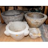 A collection of four marble and stone mortars,