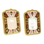 A pair of Royal Crown Derby Imari 1128 pattern picture frames, in the solid gold band,