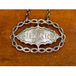 A George III silver wine label, sherry, open pierced and fretted bright cut chain design,