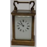 Four glass brass carriage clock,