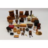 A collection of vintage dolls house furniture and accessories to include a bath, clocks, telephone,