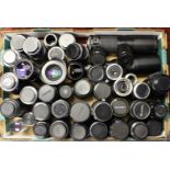 Lenses: One box of assorted camera lenses to include examples of: Paragon, Vivitar, Bell & Howell,