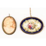 An Edwardian yellow metal and enamel brooch, the decoration on a porcelain body,