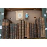 A collection of 18th and 19th Century leather bound books,