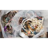 Two bags of assorted costume jewellery