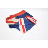 Two, material Union flags, one larger,