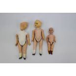 Three miniature bisque head dolls (3)