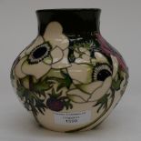 A Moorcroft bulbous vase in the Anemone pattern, 1st quality on cream and green ground,