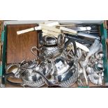 A box of silver plate to include: four piece tea service; flatware; cased fish servers;