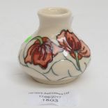 A Moorcroft miniature 1st quality squat vase in the 'Chocolate Cosmos' pattern,