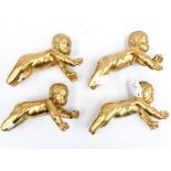 A set of four ormolu putti furniture mounts,