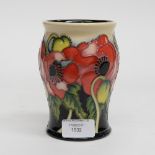 A Moorcroft trial vase, 1st quality, red flowers on black ground, rising to cream black interior,