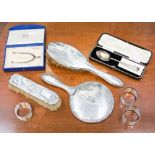 A collection of silver and silver plated items including a silver spoon,