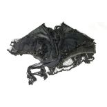 A Victorian black lacework mourning cape