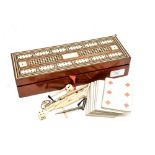 A Victorian Tunbridge ware games box with cribbage board lid and a full set of cards within,