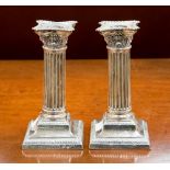 A pair of silver candlesticks, Sheffield 1911 maker probably Martin Hall,