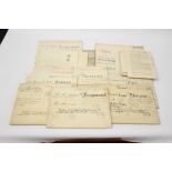 A bag containing a quantity of 19th-century vellum mortgage indentures relating to Middlesex,
