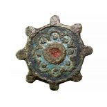 Roman Enamelled Disc Brooch, 2nd Century AD. A Roman disc brooch with eight peripheral lugs.