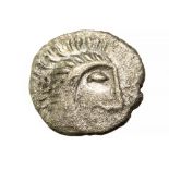 Iceni 'Norfolk God' Silver Unit, 30-10 BC Obv: Moustachioed male head right; oval eye,