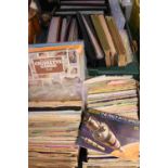 Two boxes containing a large collection of cigarette cards in albums, mostly odds and part-sets,