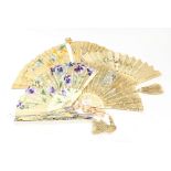 A collection of five 19th century fans with bone and ivory sticks and guards, one pierced,