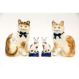 Four Staffordshire flatback cats,