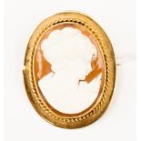 A 9ct gold cameo brooch, the rub over mount with millegrain edging and rope twist decoration,