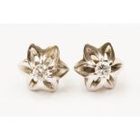 A pair of diamond stud earrings, each claw set brilliant diamond of approx 0.