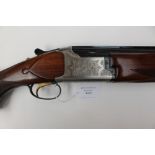 12 Bore Miroku Over and Under Shotgun. Grade III. 30 inch barrels. Serial number 2280279.