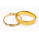 Two hinged rolled gold bangles, one in the form of bamboo, approx 7mm wide, diameter 60mm,