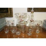 A set of Hunt themed glassware with painted decoration of Huntman and Foxes: Jug, decanter,