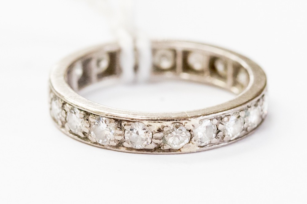 A diamond full eternity ring, nineteen round brilliant cut diamonds,