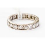 A diamond full eternity ring, nineteen round brilliant cut diamonds,