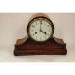 A 1920s Art Deco oak cased eight day mantle clock,